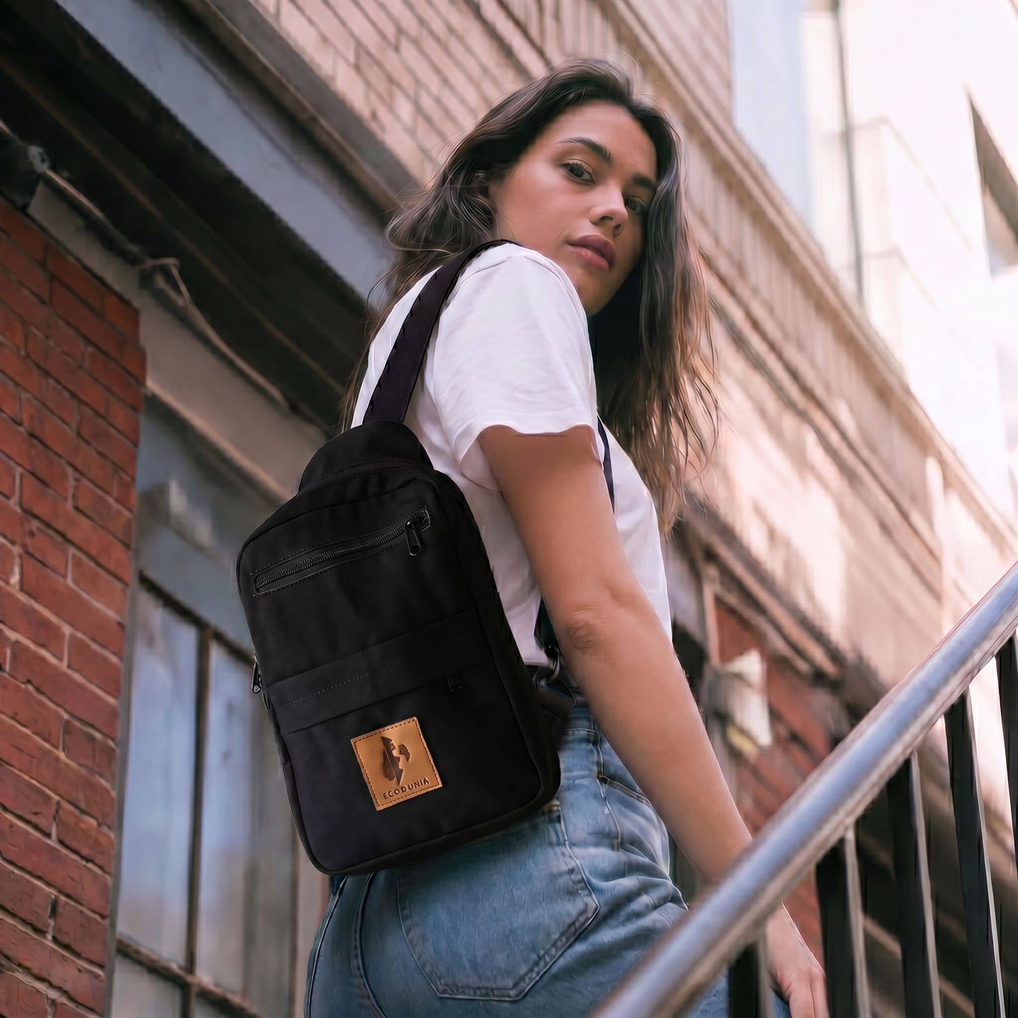 Umoja black canvas crossbody sling bag for men and women