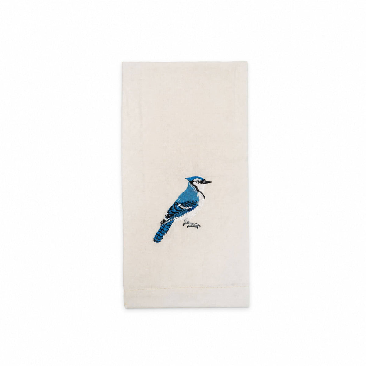Bluejay bird embroidered cotton tea towel flat lay on white surface