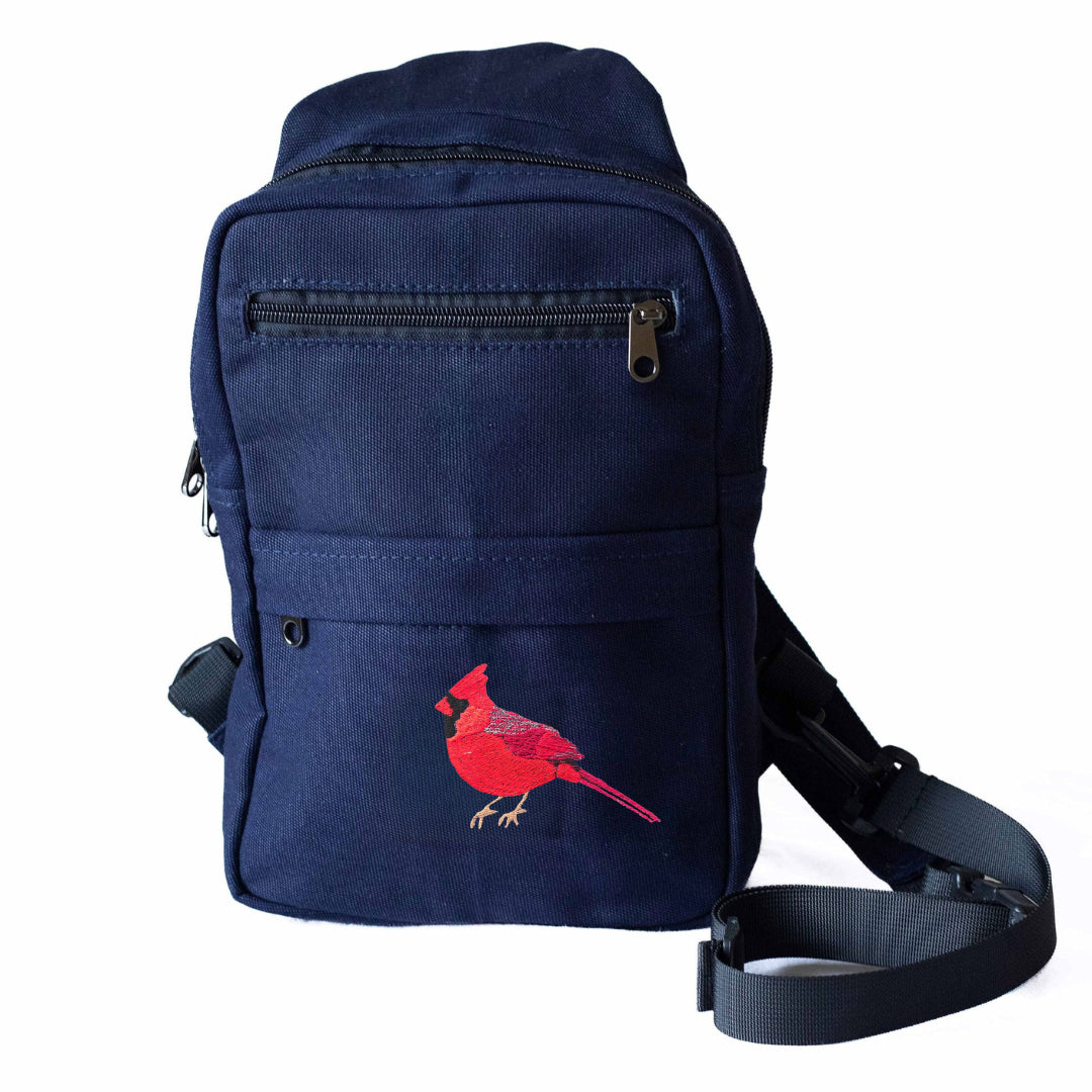 Cardinal Umoja embroidered canvas sling bag with birds