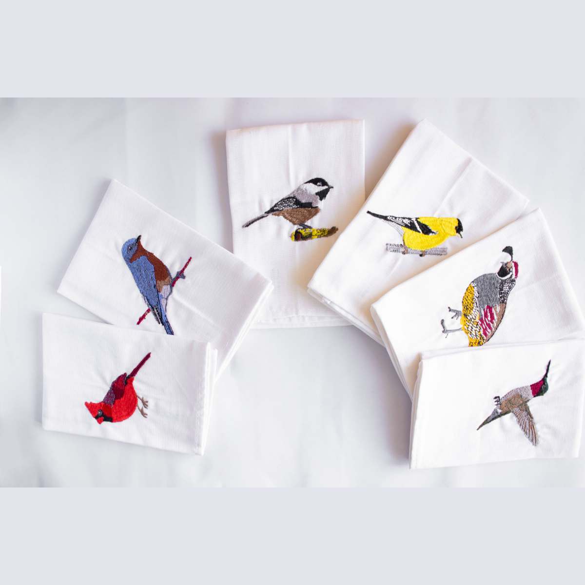Bird embroidered cotton napkin hand-stitched embroidery detail