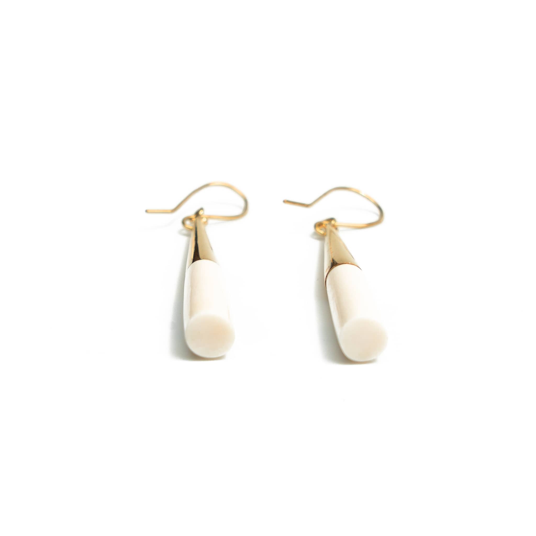 Lulu brass and white horn drop earrings flat lay — Ecodunia