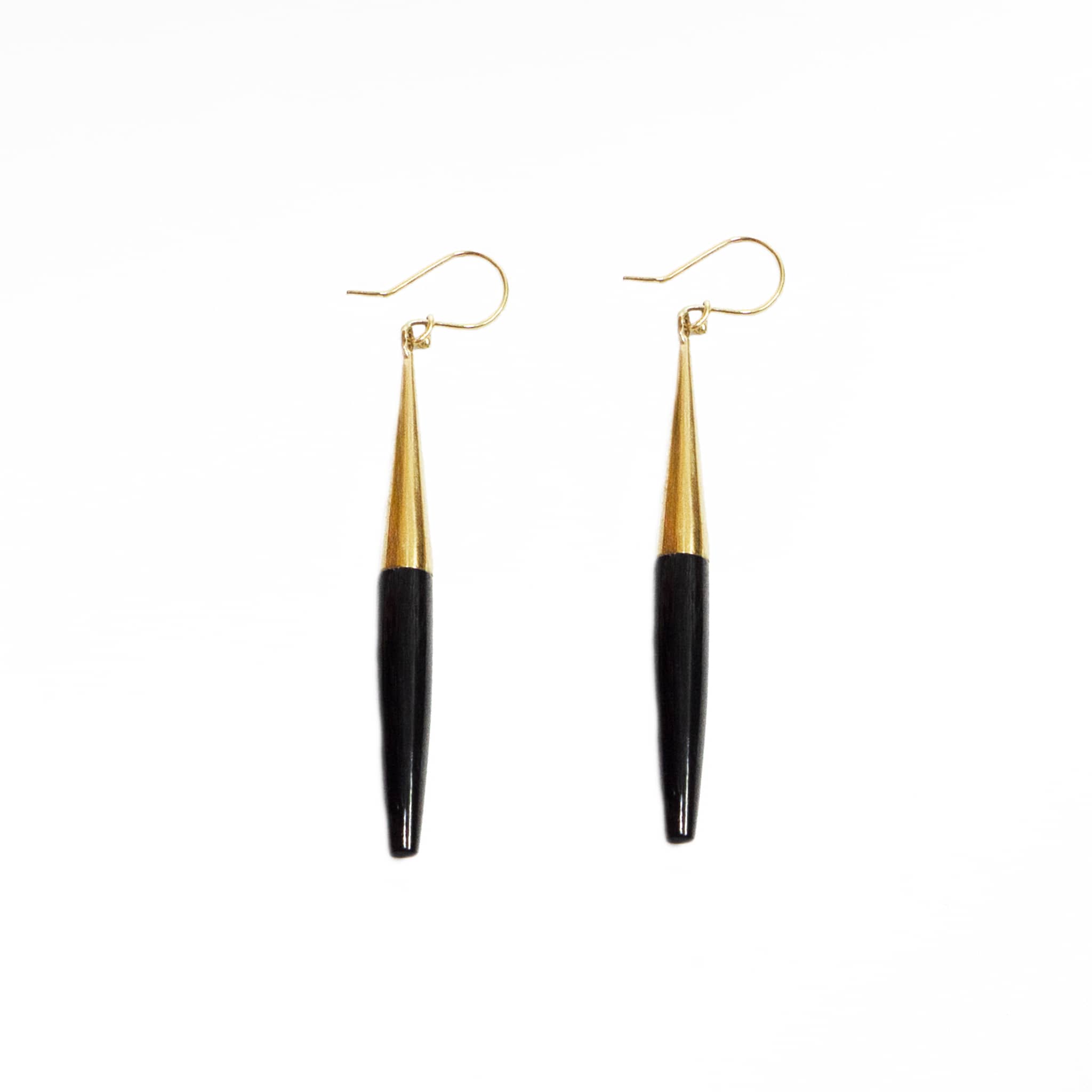 Luna brass and white horn spike drop earrings flat lay — Ecodunia