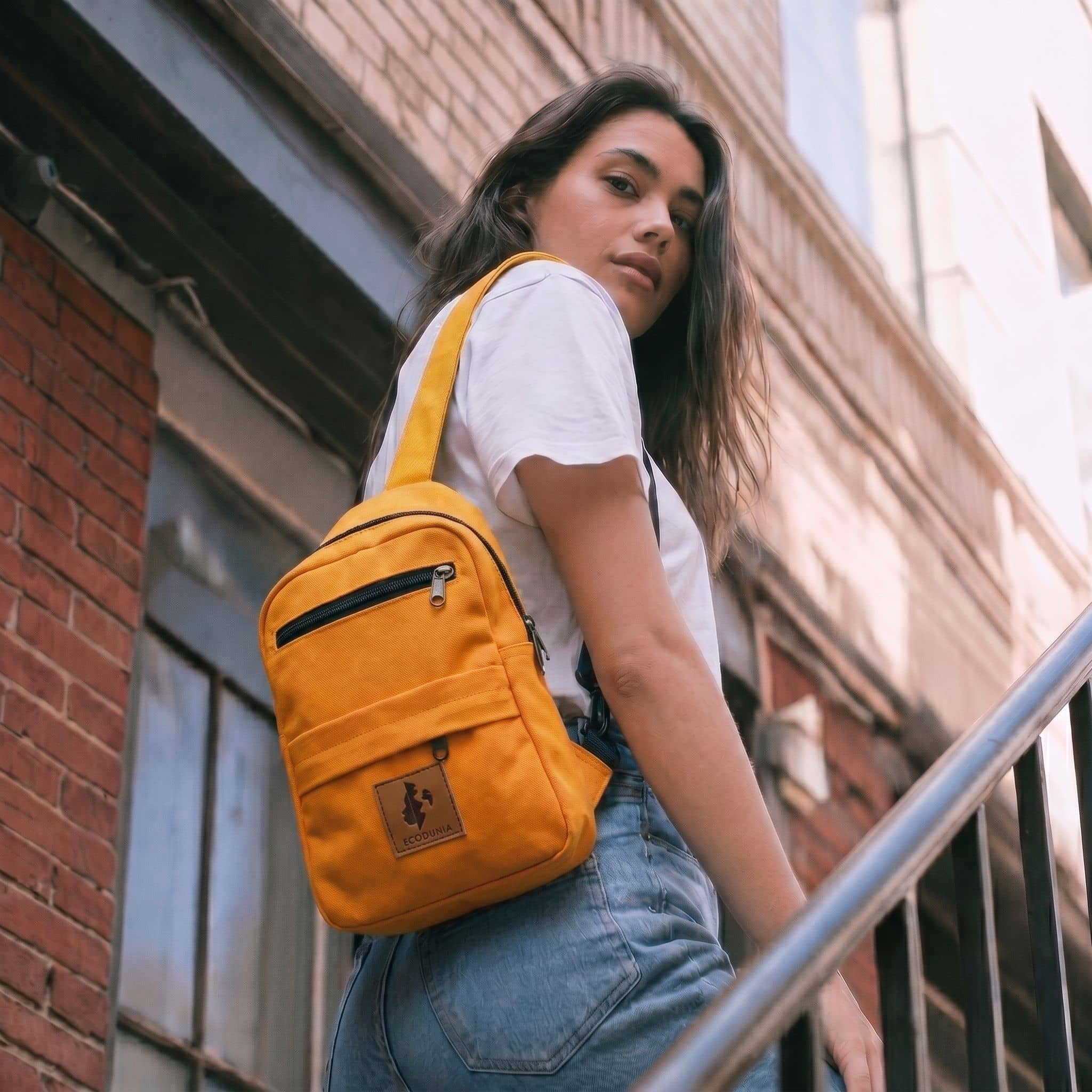 Umoja orange canvas crossbody sling bag
