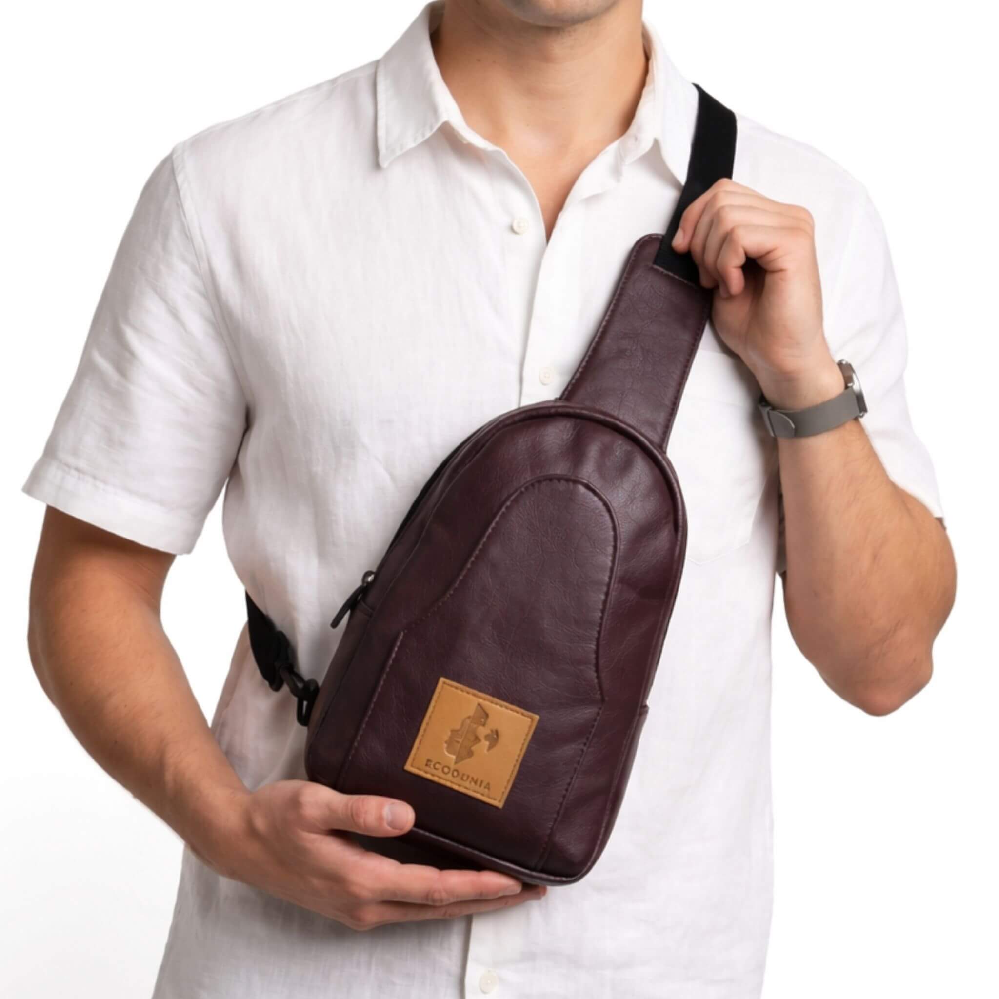 Buru plum vegan leather sling bag worn crossbody