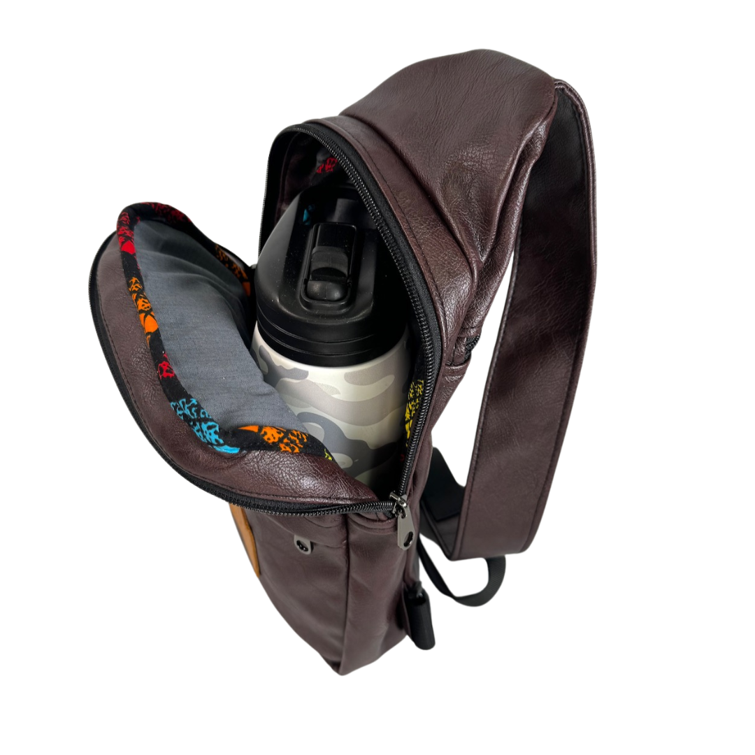 Umoja plum purple vegan leather sling bag flat lay