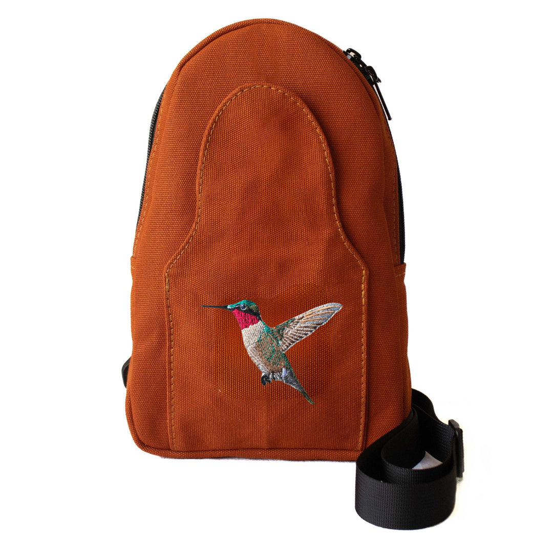 Buru hummingbird embroidered canvas sling bag in rust #color_rust