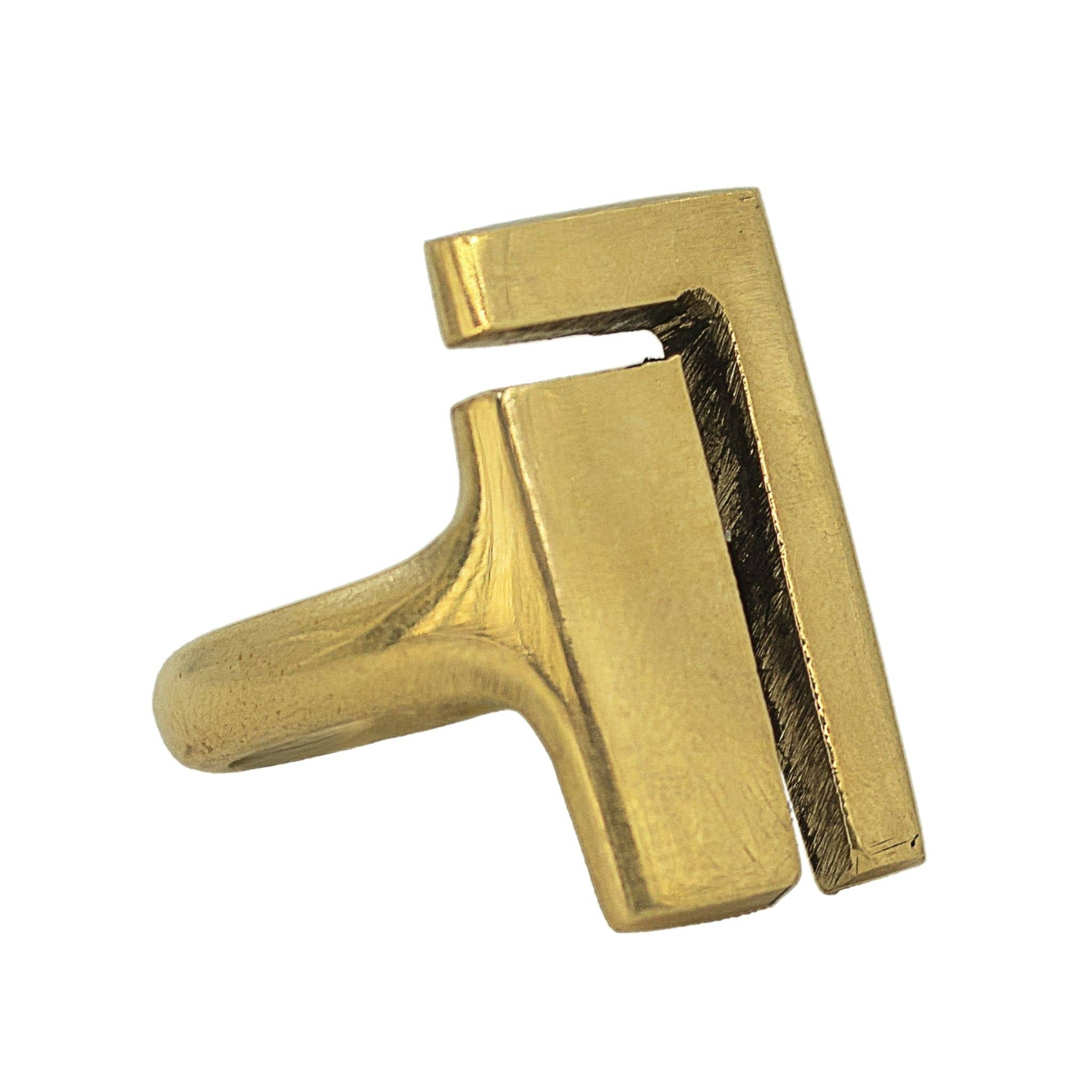 Close-up of Juzi open square brass ring showing flat geometric face