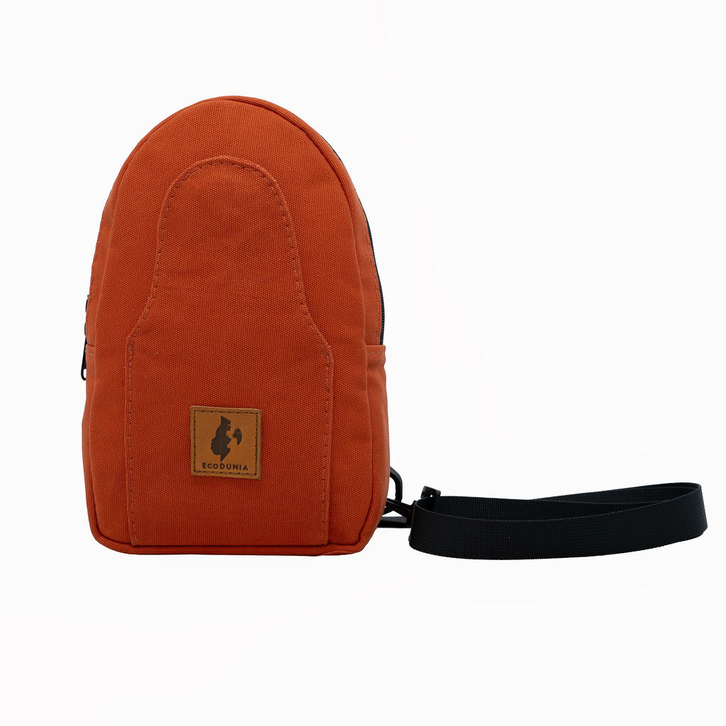 Buru canvas sling bag in rust — sustainable handmade crossbody
