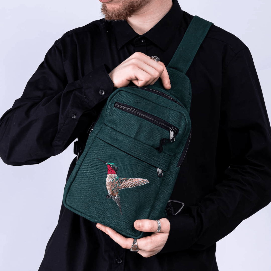 Umoja hummingbird canvas sling bag in forest green