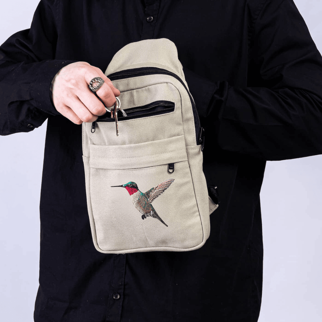 Umoja hummingbird canvas sling bag in sand white