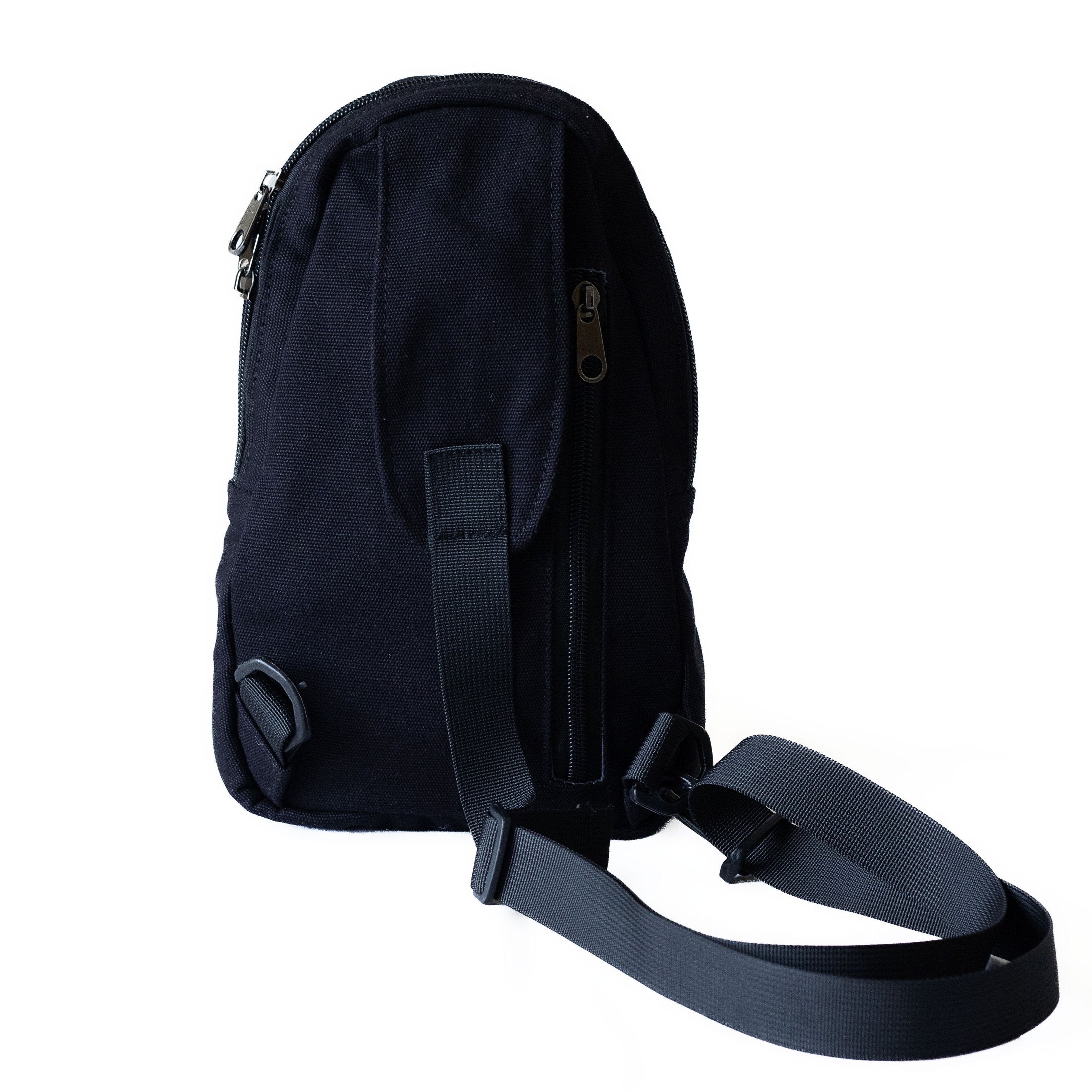Buru black canvas sling bag showing adjustable strap detail