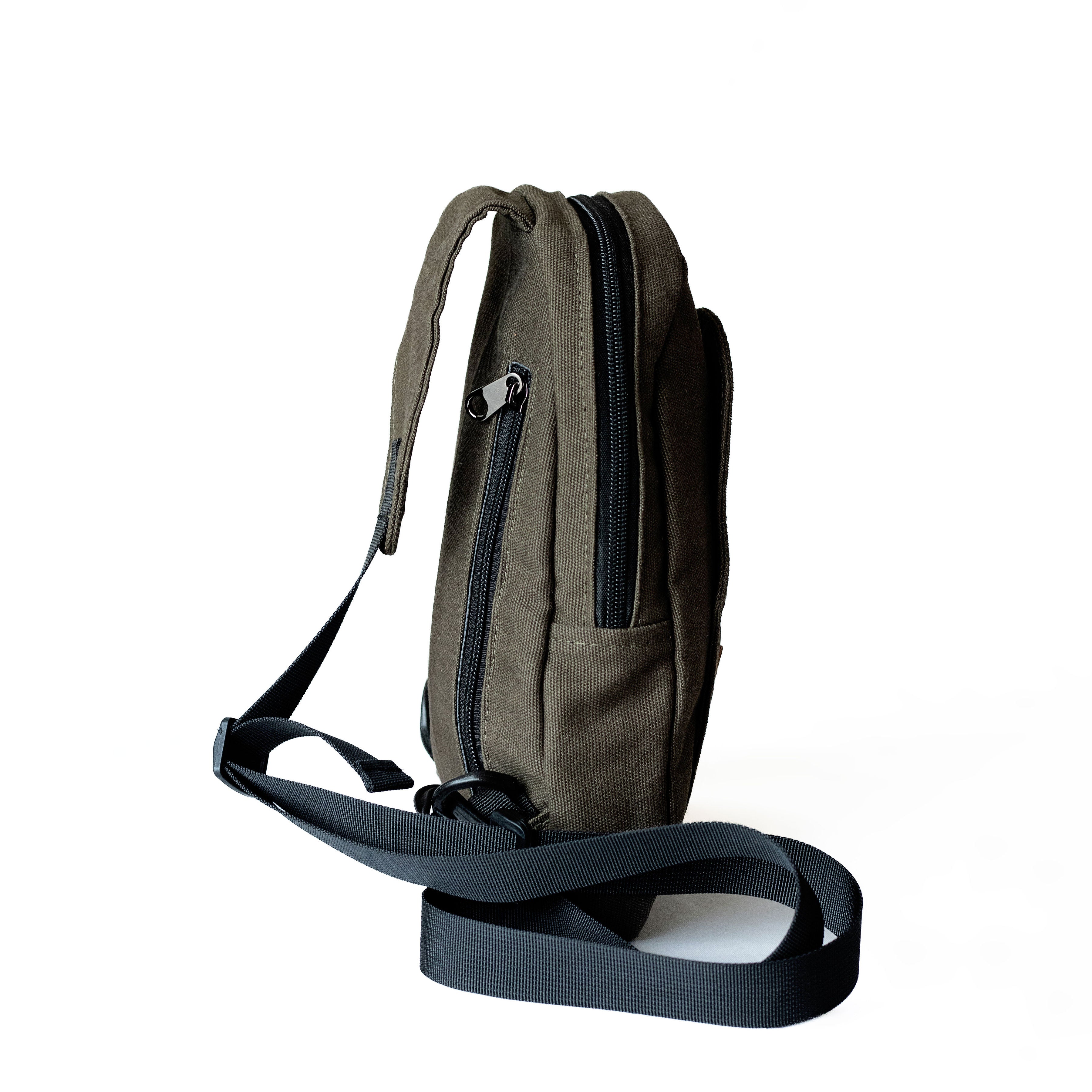 Buru green small canvas sling bag flat lay