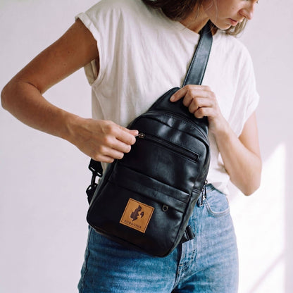 Umoja black vegan leather large crossbody sling bag 