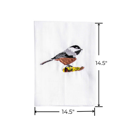 Bird embroidered cotton kitchen napkin close-up on white