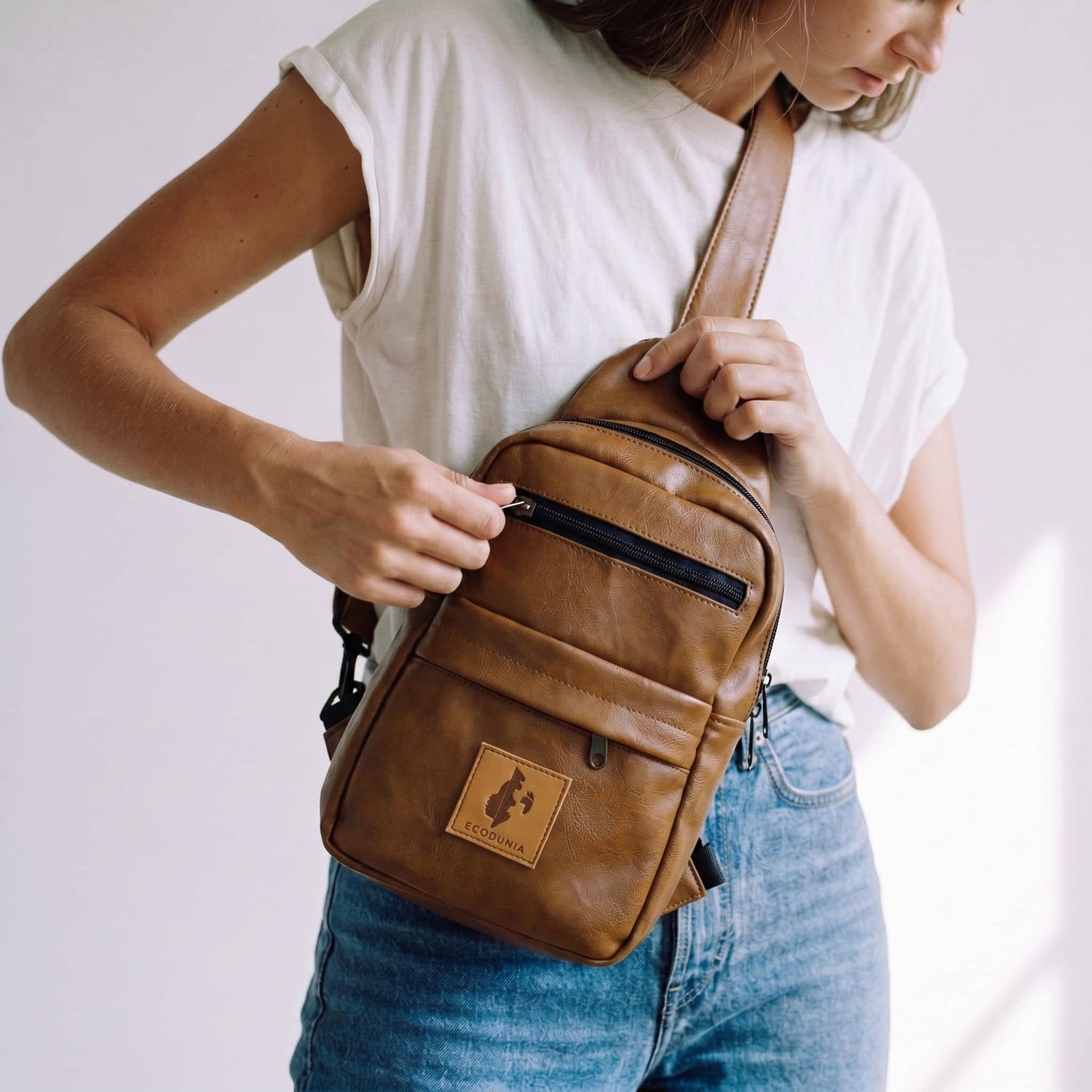 Umoja dark tan vegan leather large crossbody sling bag — Ecodunia 