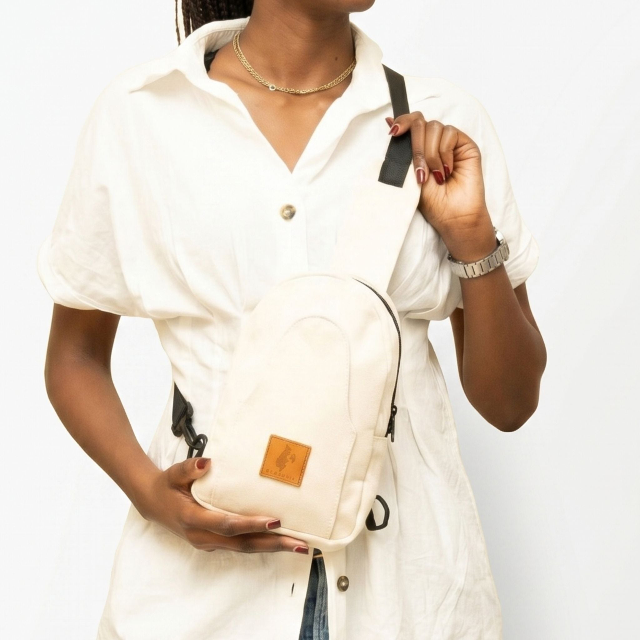 Buru small canvas sling bag in natural 