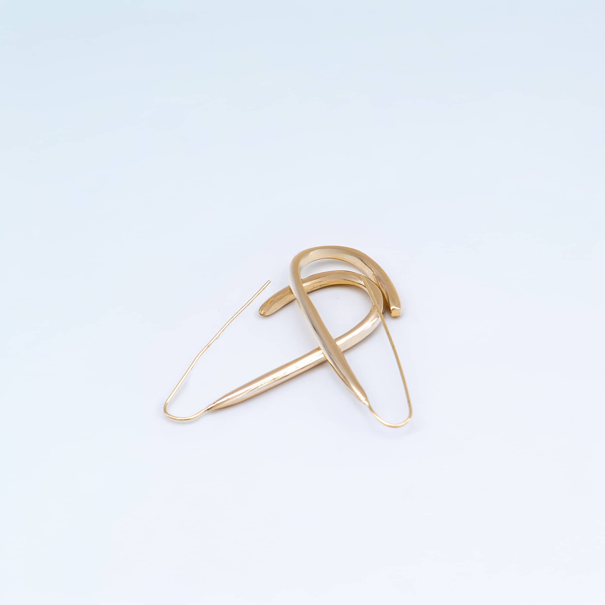 Ona U-shaped open brass hoop earrings flat lay — Ecodunia