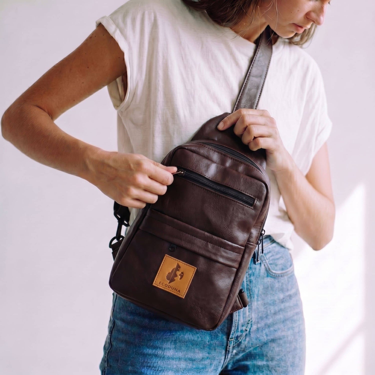 Umoja plum vegan leather men crossbody sling bag 