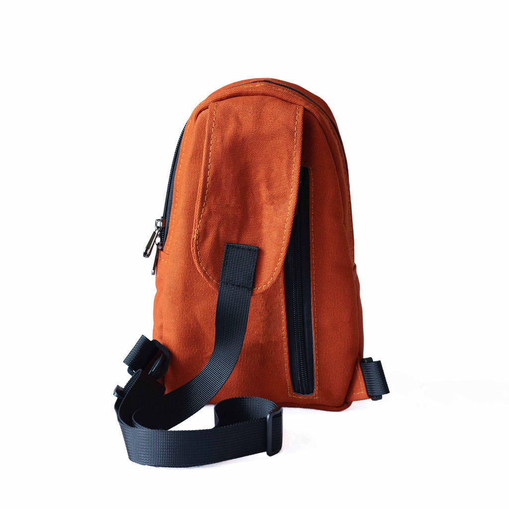 Buru canvas sling bag in rust — sustainable handmade crossbody 
