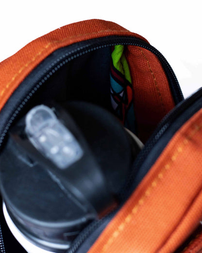 Buru canvas sling bag in rust — sustainable handmade crossbody 