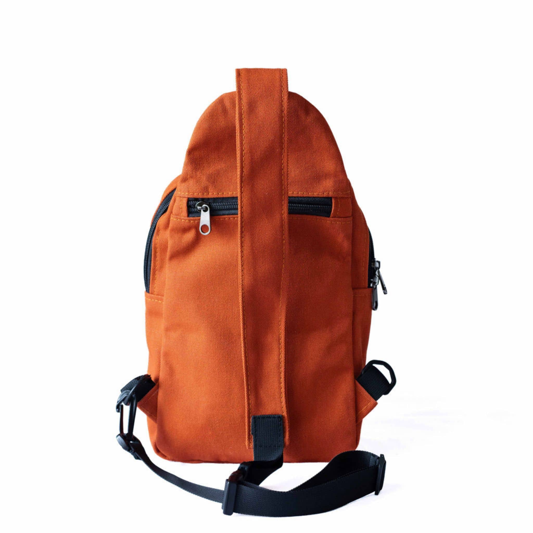 Umoja rust canvas outdoor crossbody sling bag 