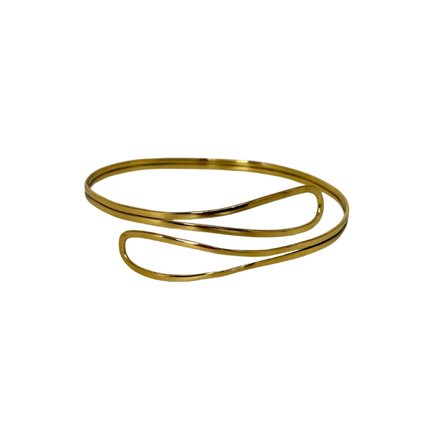 Sai double loop wrap brass armlet flat lay — Ecodunia