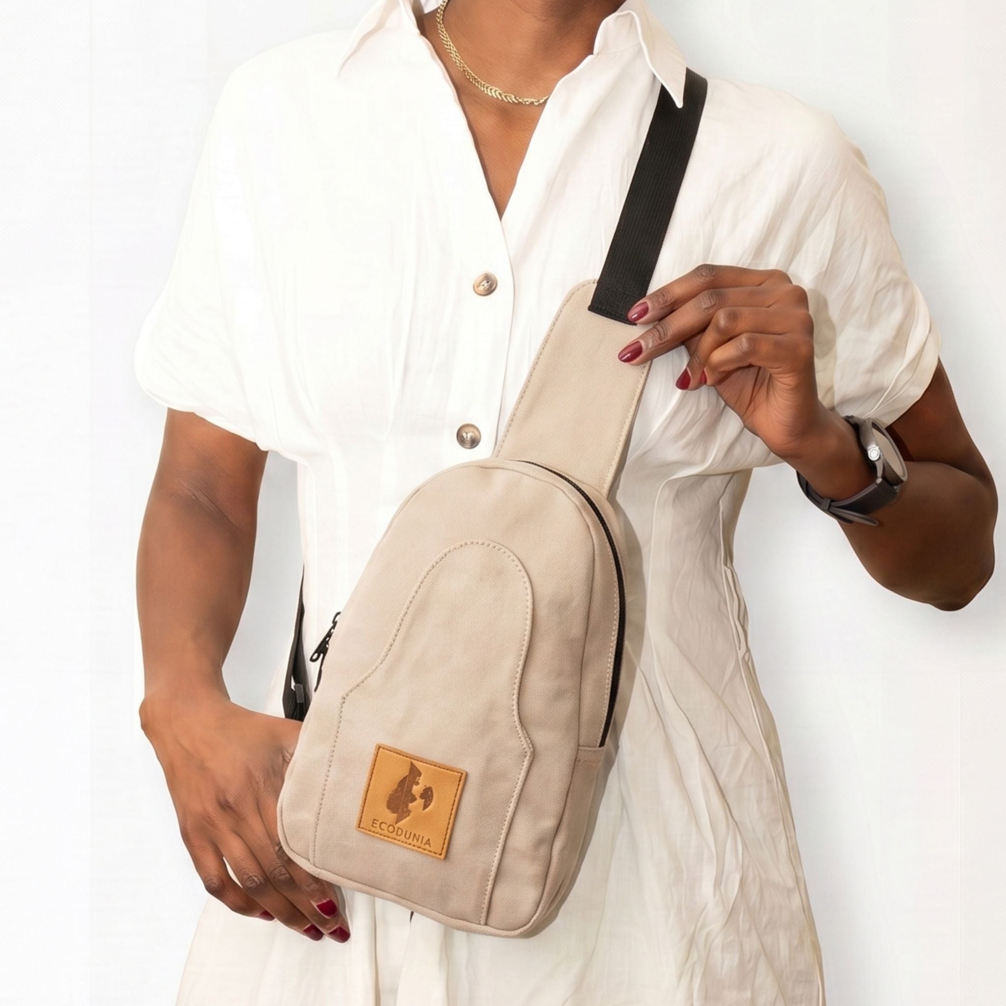 Buru canvas sling bag in sand white #color_sand-white