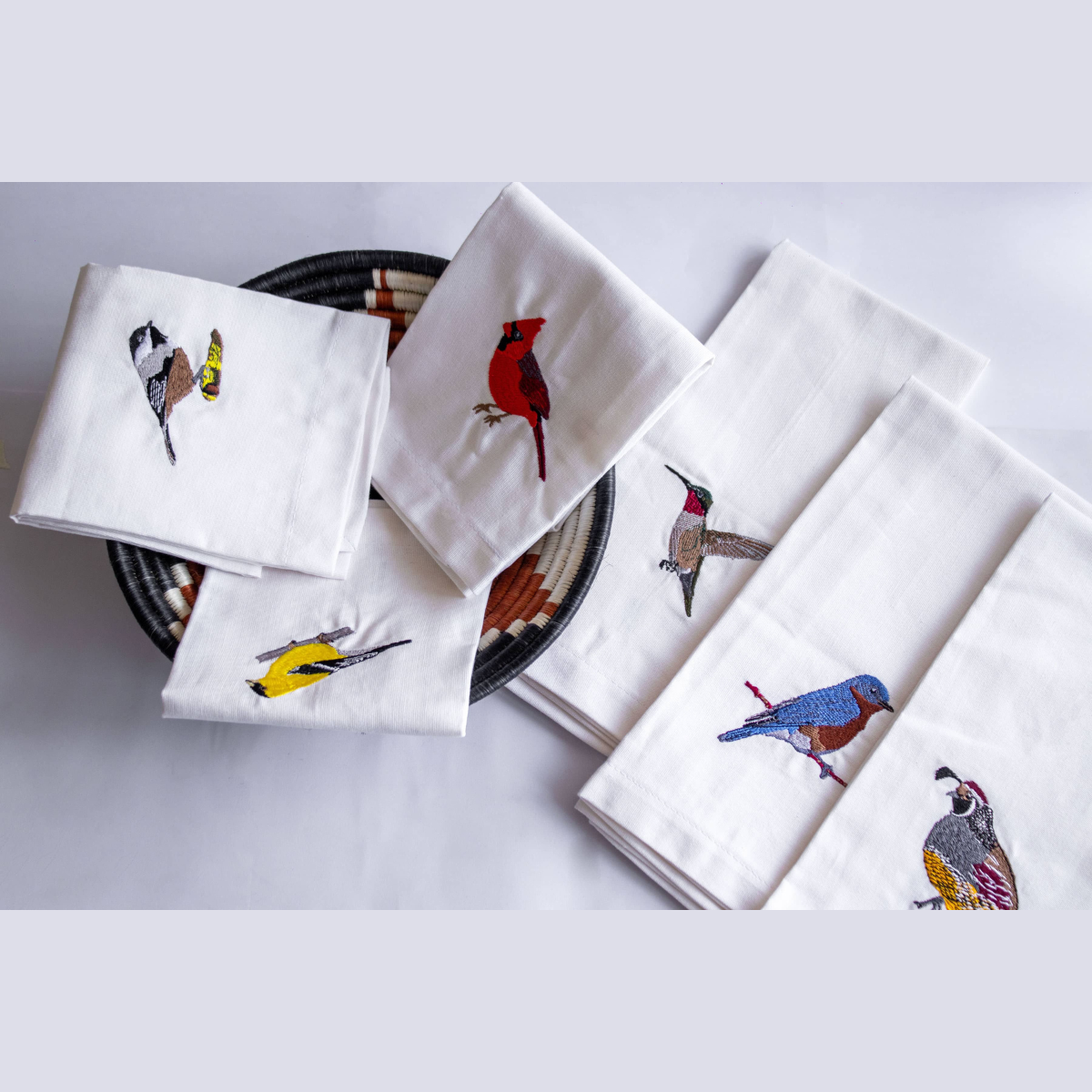 Cotton kitchen tea towels with hand-embroidered bird designs set