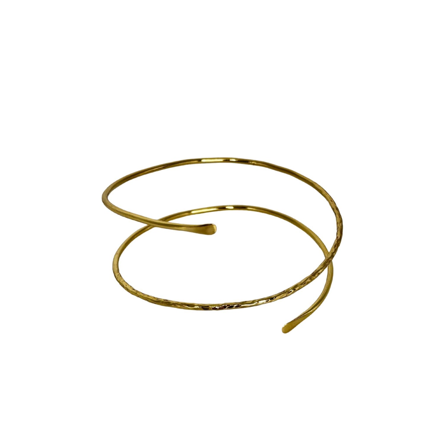 Wayu minimalist coil brass armlet flat lay — Ecodunia