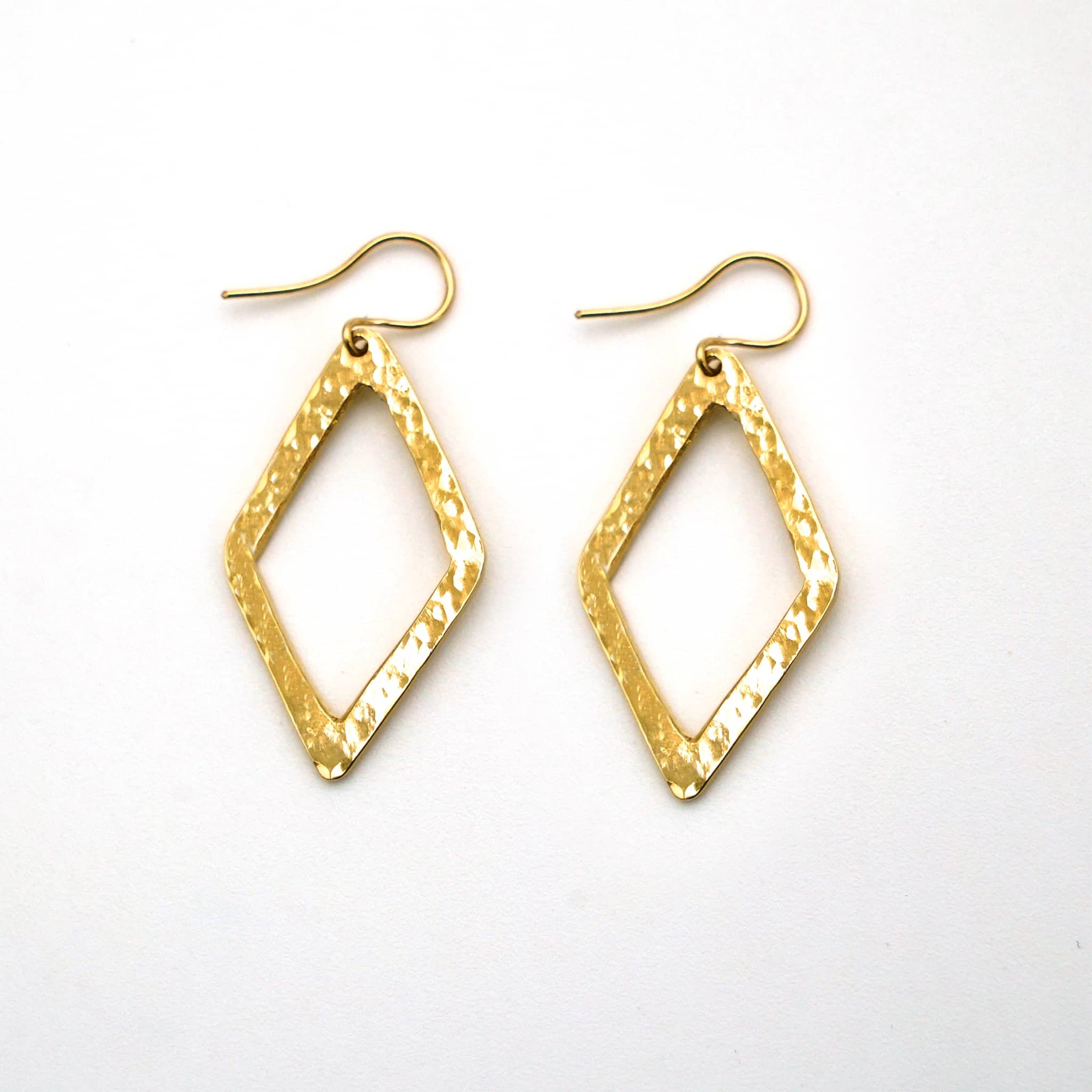 Wazi hammered open diamond brass earrings flat lay — Ecodunia