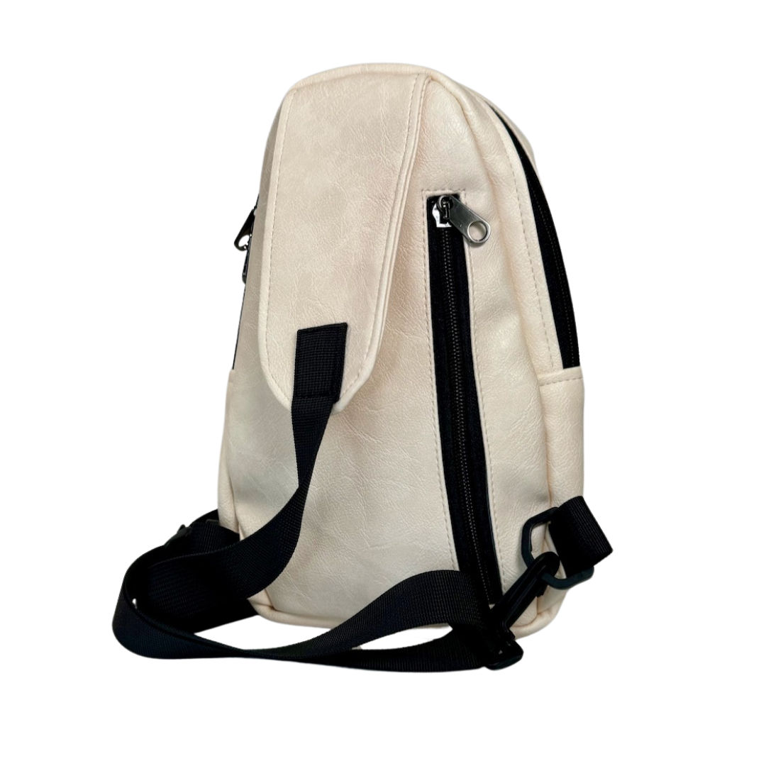 Buru cream vegan leather sling bag flat lay everyday carry 
